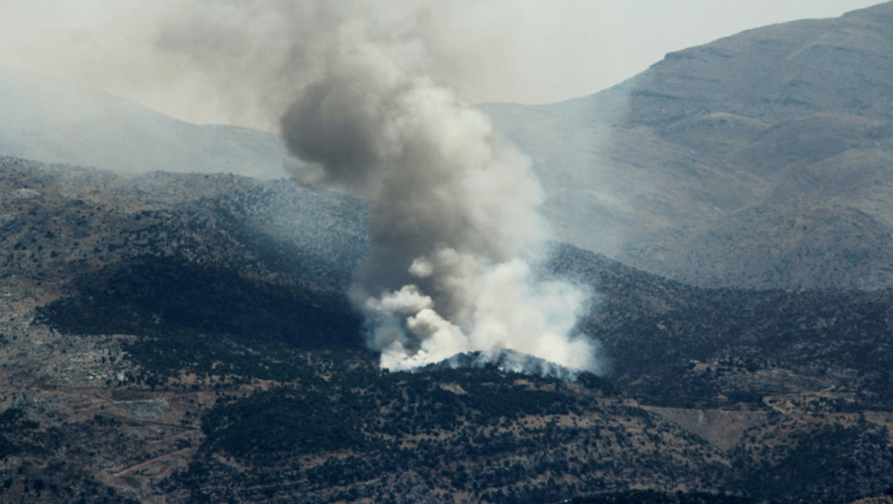 Smoke billows from forest fires near the southern Lebanese village of Shebaa on Thursday. The cross-border conflict with nearby Israel has escalated significantly since Israel killed a high-level Hezbollah commander on Wednesday.